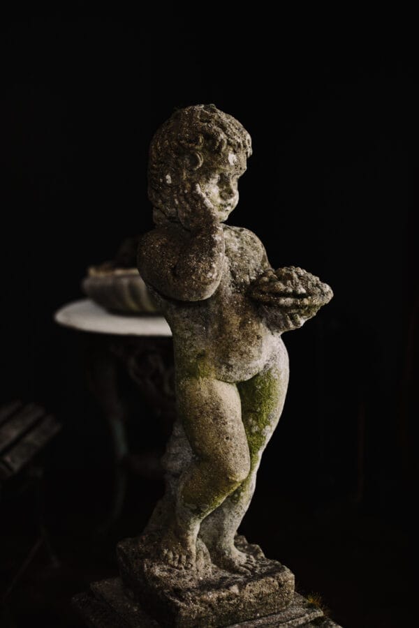 Antique Stone Composite Putto Statue on a Plinth - Image 11