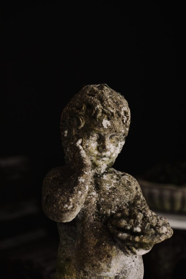 Antique Stone Composite Putto Statue on a Plinth - Image 3