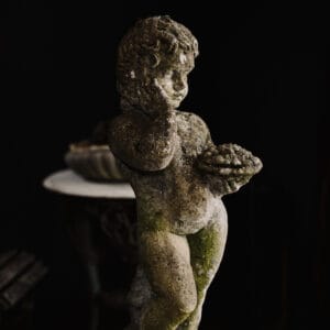 stone putto statue