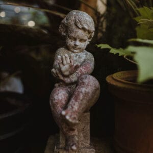antique stone cherub