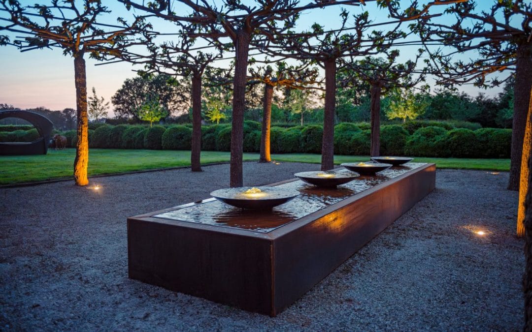 corten steel water table with bowls Surrey garden designer