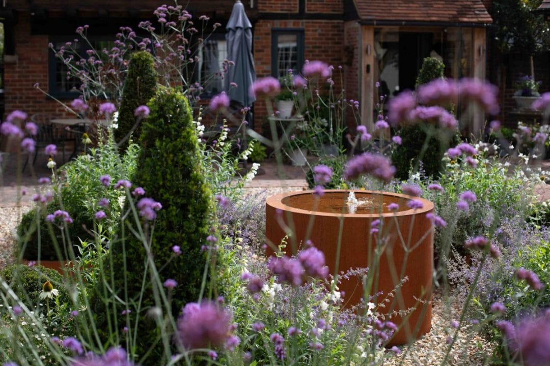 garden design gardening fountain water feature topiary flower bed raised bed garden