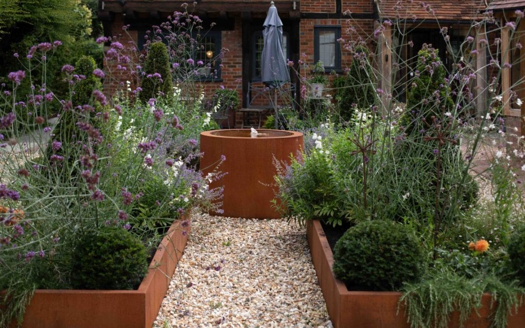 garden design gardening raised beds flower beds water feature fountain orangery topiary