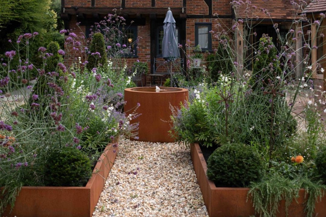 garden design gardening raised beds flower beds water feature fountain orangery topiary