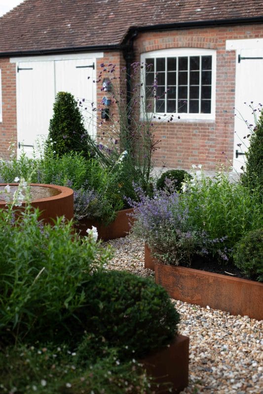 garden design  gardening flower beds raised beds water feature fountain landscaping remodel redesign