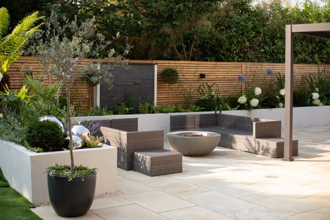 garden design patio fire pit flower bed plants outdoor seating