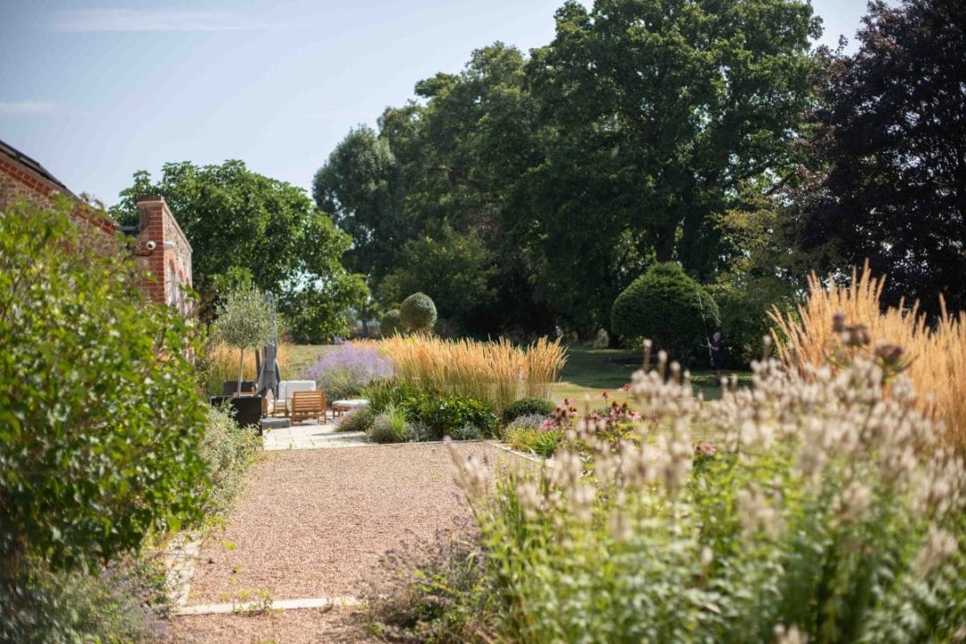 gardening garden design landscaping Surrey West Sussex grasses autumn garden inspiration patio 