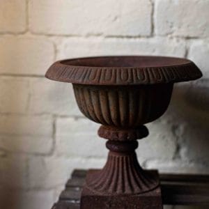 Pair of Cast Iron Ribbed Urns