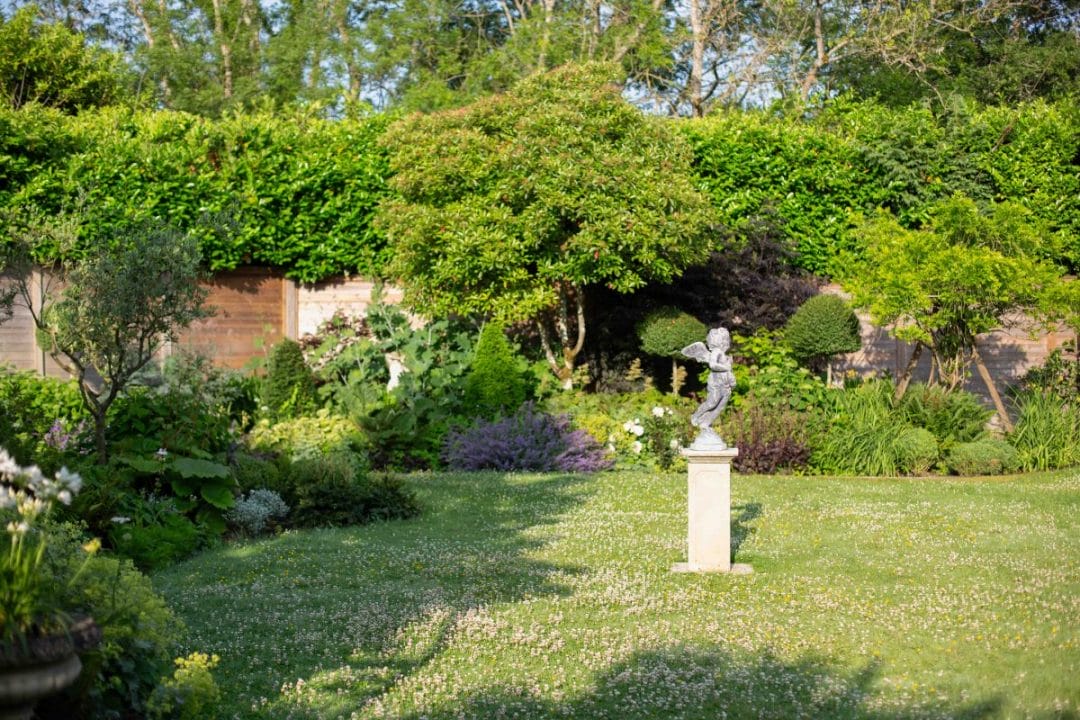 gardening garden design landscaping Surrey West Sussex horticulture structure planting evergreens garden bed layout flower bed